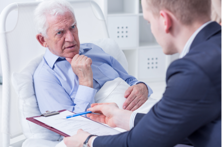 Senior talking to a lawyer for his will