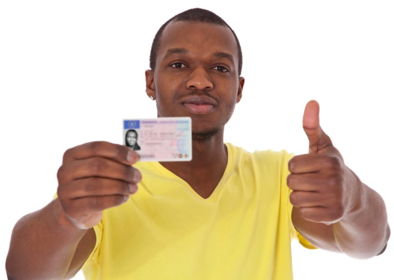 man showing his driver's license